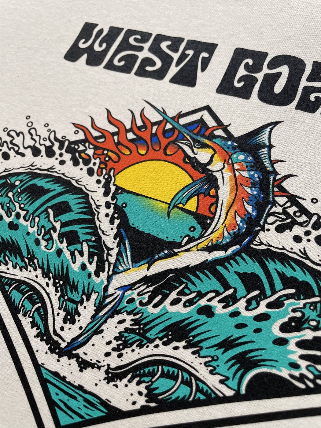 Cream t-shirt with a multi-colour wave and sunset screen print