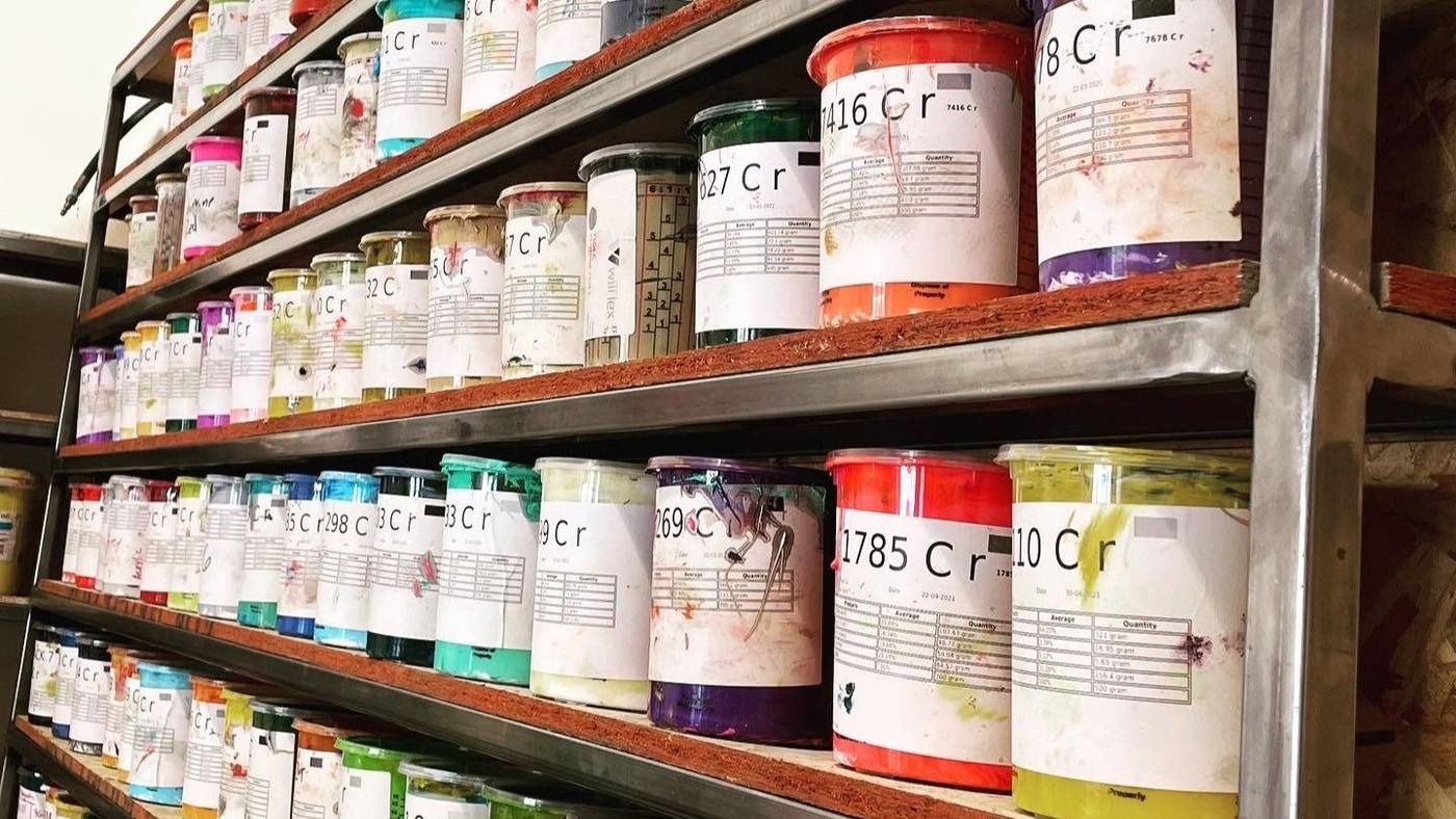 Shelves of screen printing ink at the Kinetic Print Co shop in Claremont