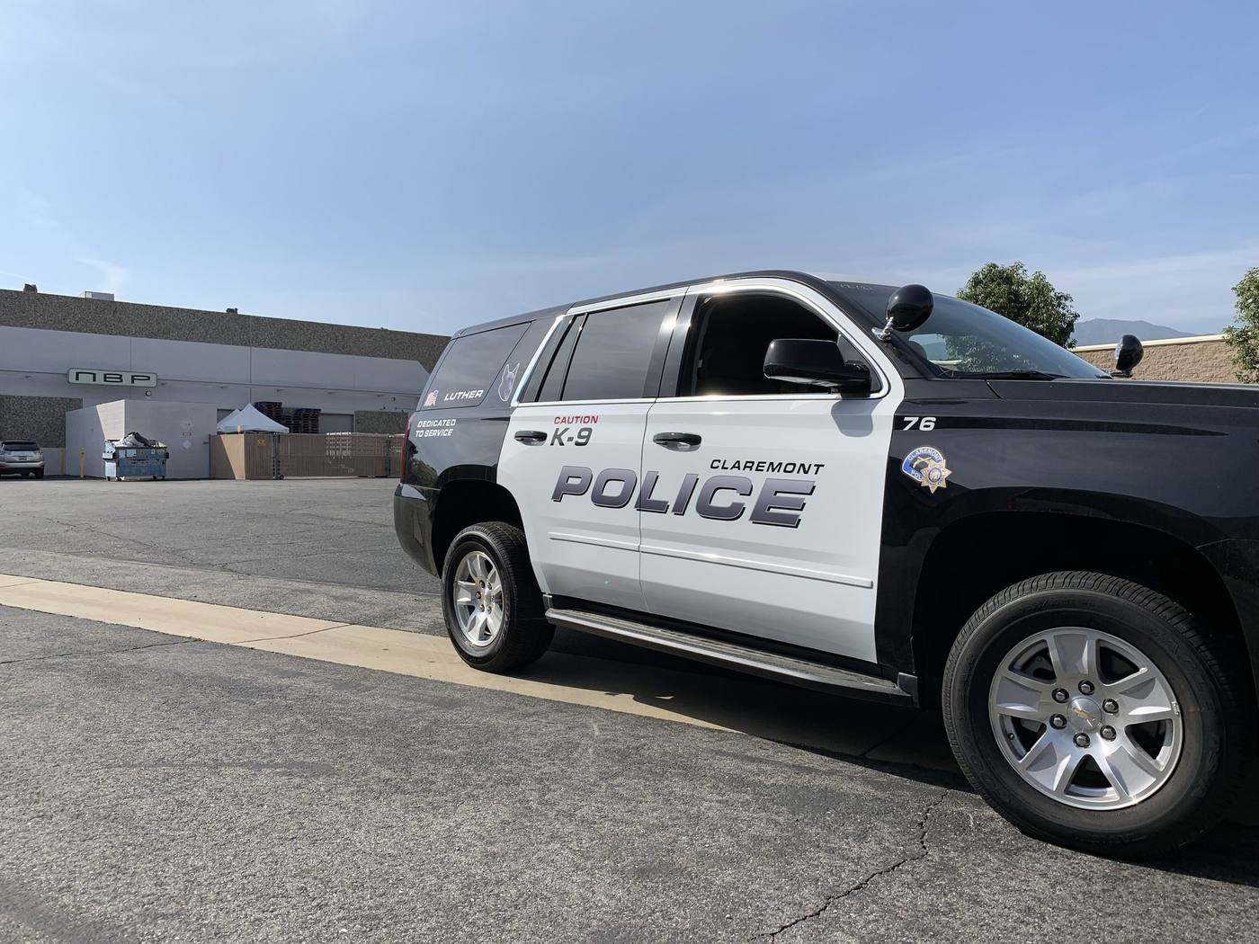 Claremont Police K-9 SUV with reflective door graphics and lettering