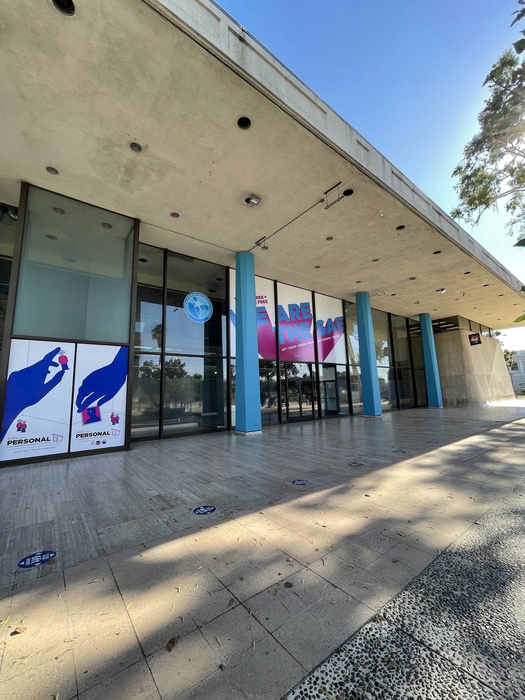 Printed window graphics and banners installed across the School of Arts and Enterprise building